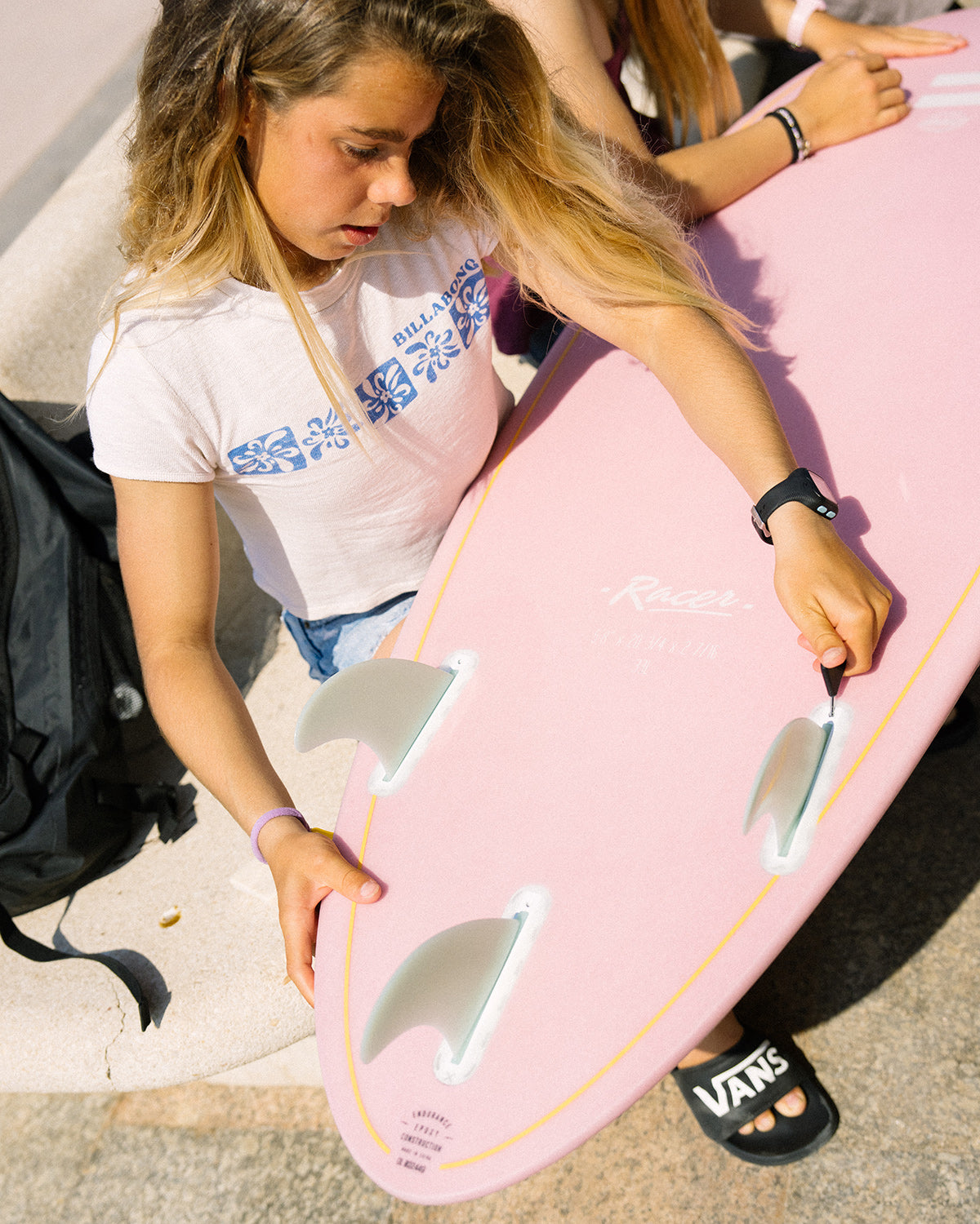 Setting up the fins on the Indio Racer surfboard